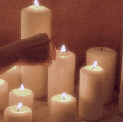 Candles lit in prayer